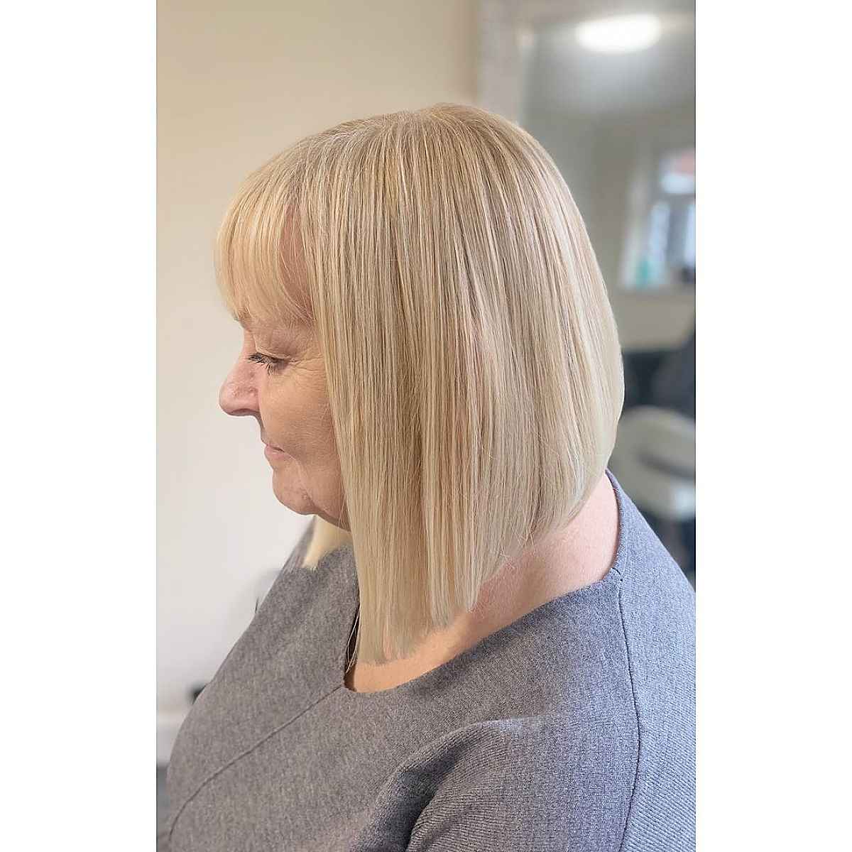 Trendy Long Inverted Bob for Round Face Shapes Over 60