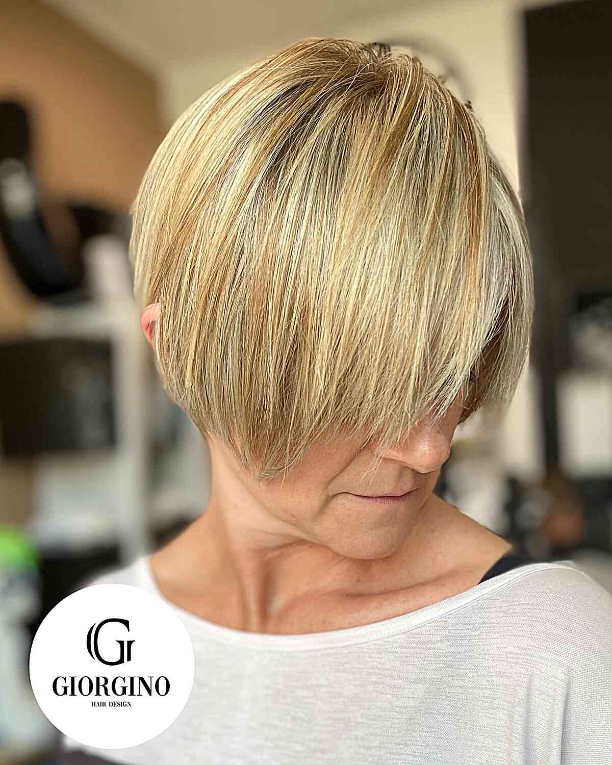 Stylish Long Pixie Bob with Radiant Blonde Highlights for mature women 70 and over