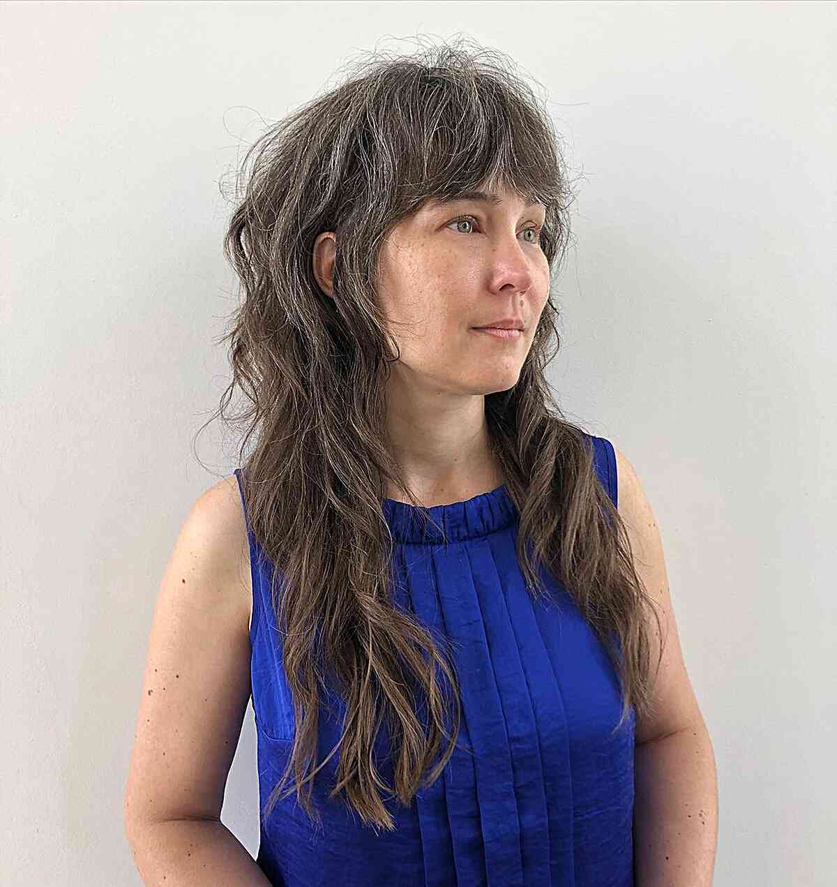 Chic Long Razor Cut Shag with Full Bangs