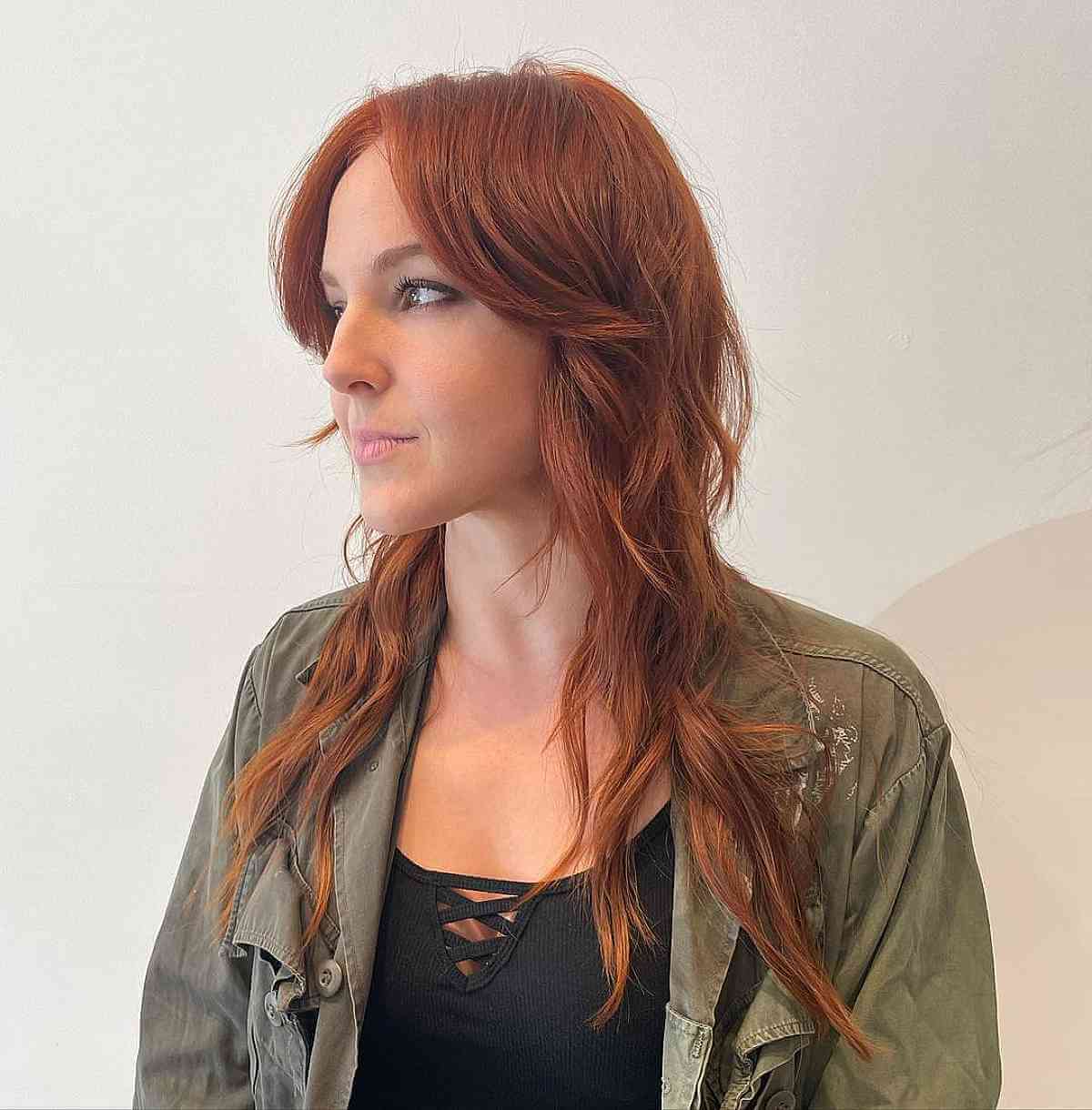 Stylish Long Shag with Subtle Short Layers and Curtain Bangs