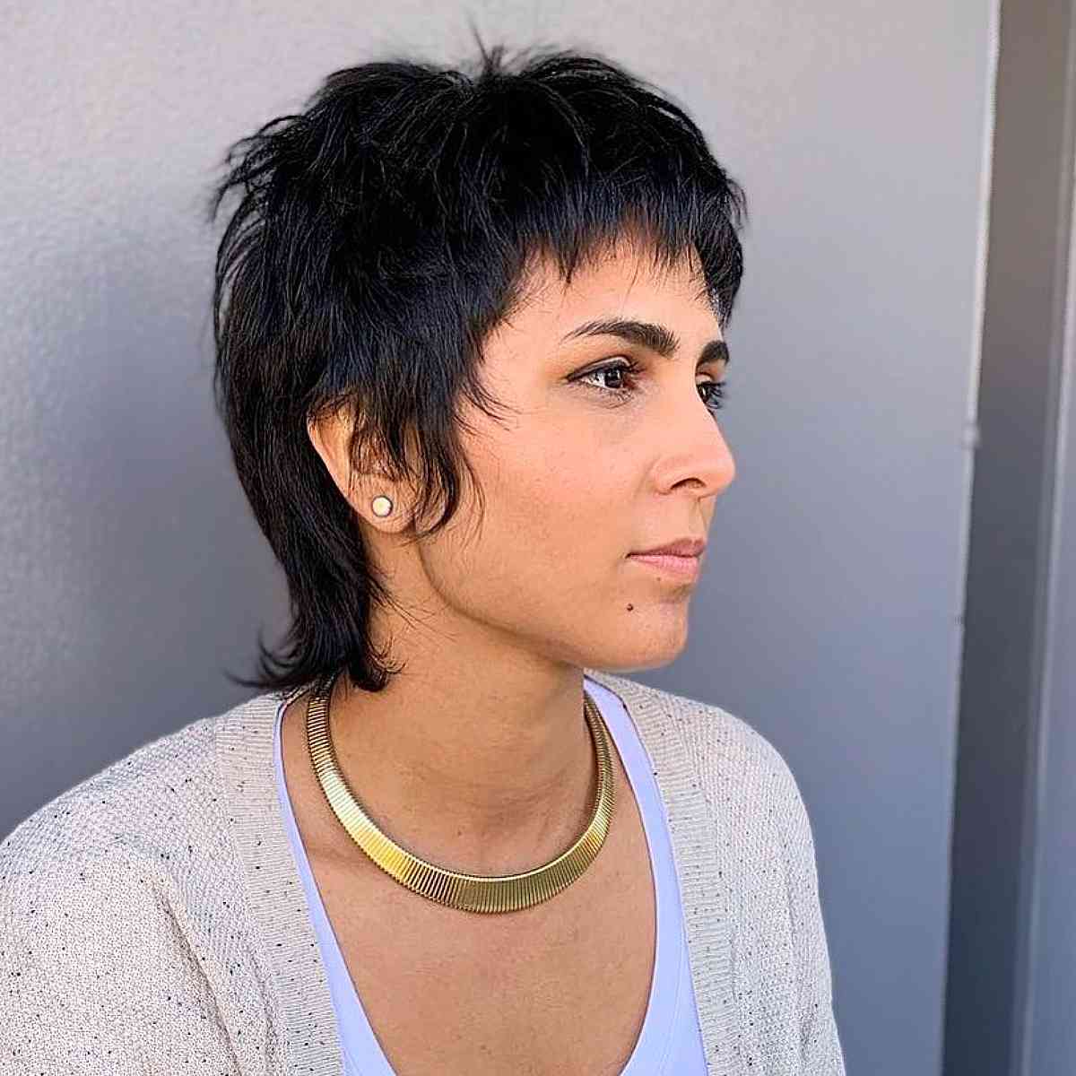Stylish Long Shagged Pixie with Textured Bangs