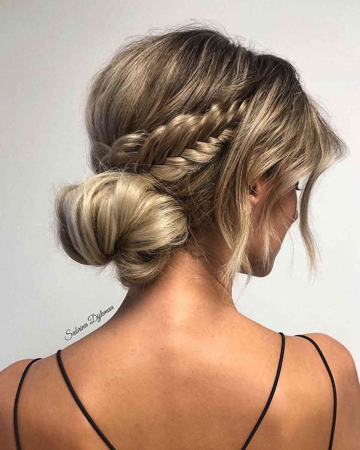 Stylish Low Bun with Textured Braids