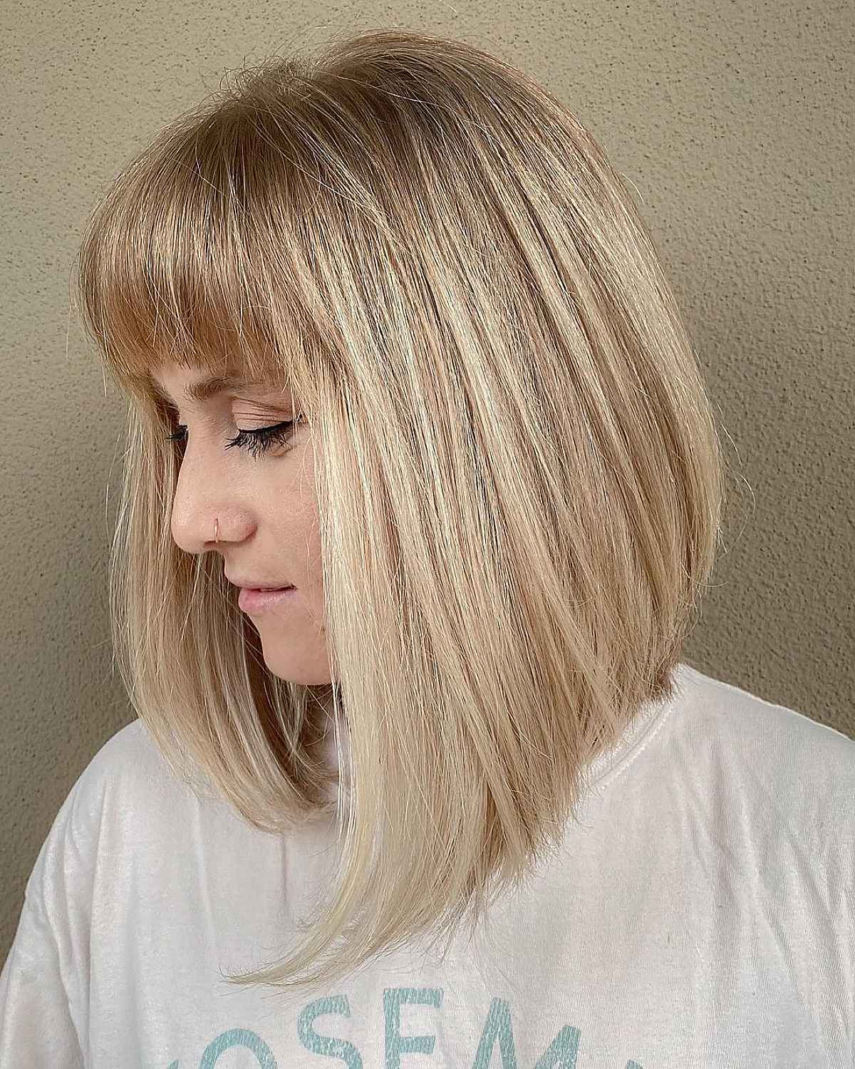 Stylish Medium-Length Graduated Bob with a Bold Fringe