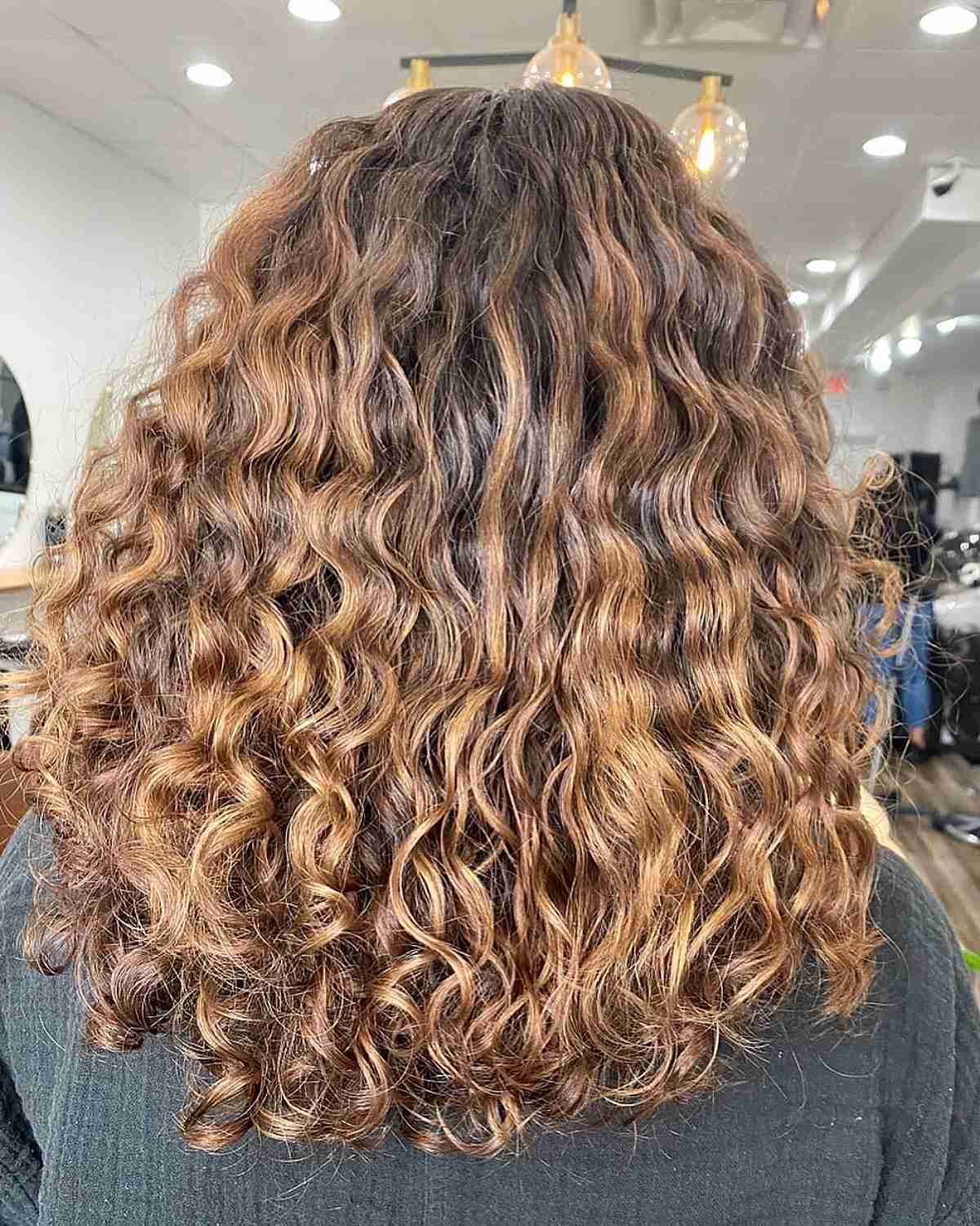 Stylish Mid-Length Curls with Ginger Brown Balayage Ombre