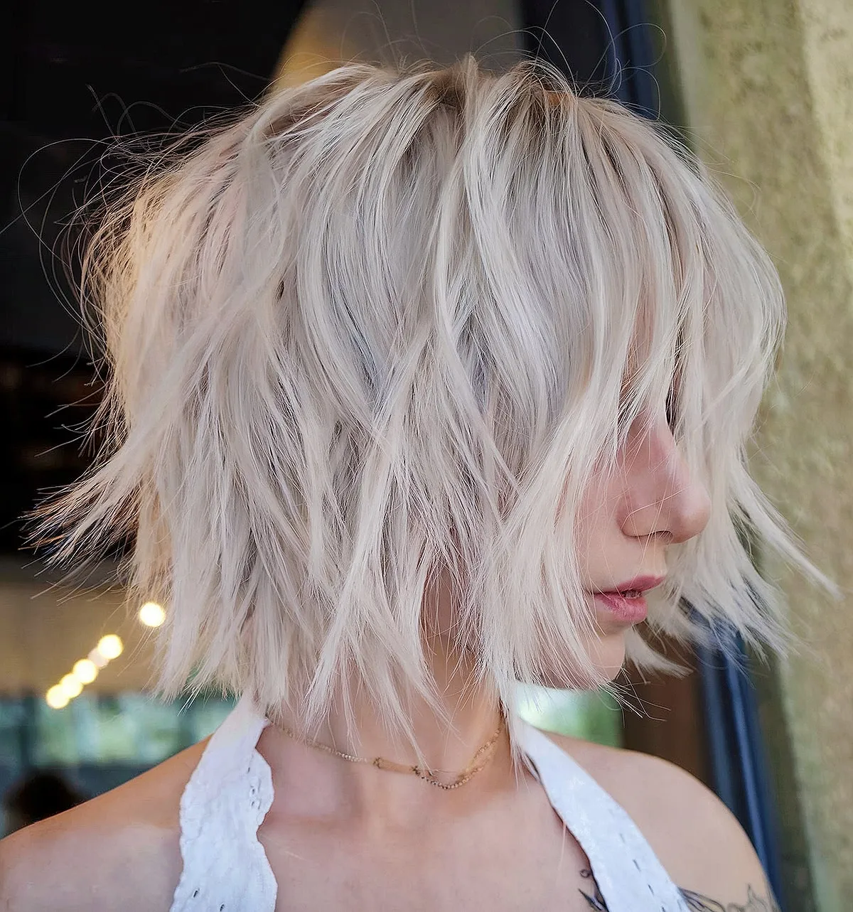 Platinum shaggy bob on a short haircut