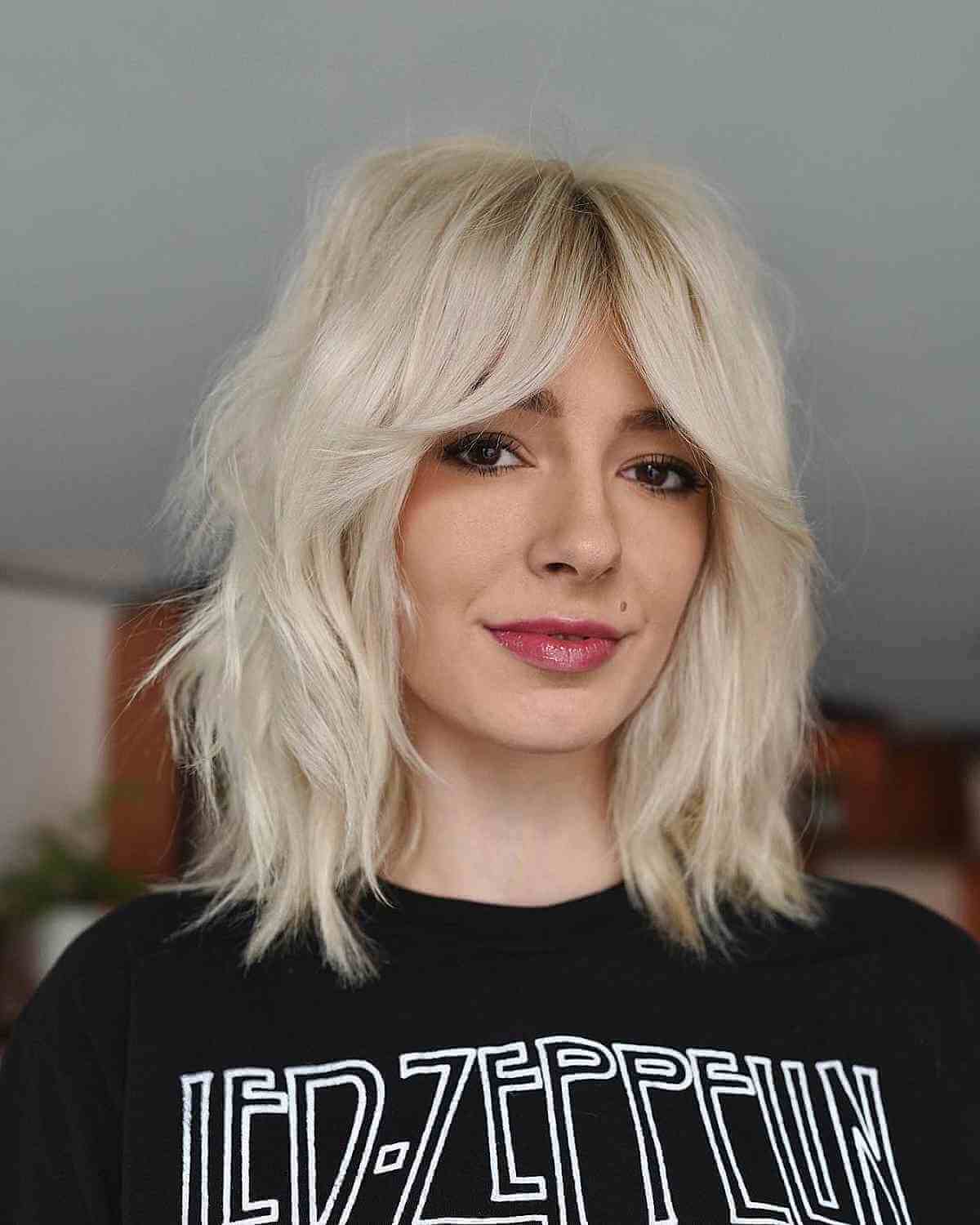 Stylish Platinum Undone Shag with Curtain Bangs