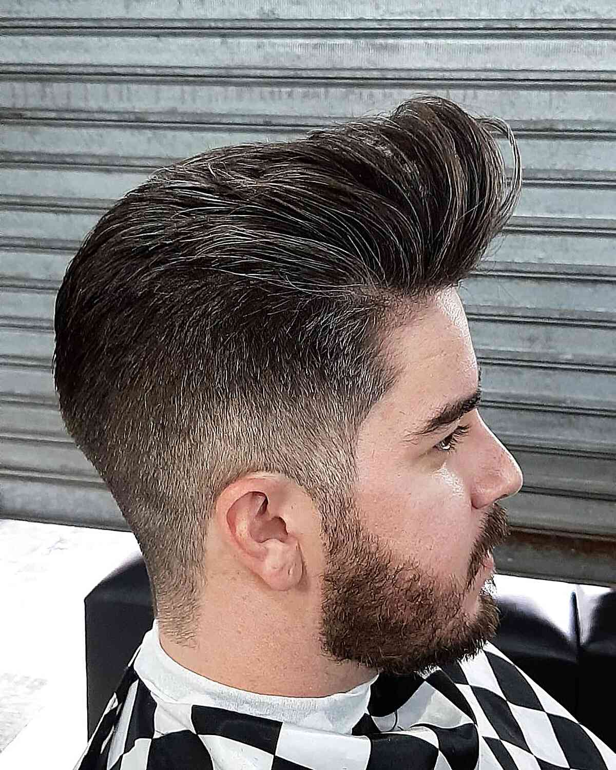 Stylish Quiff Pomp with Tapered Sides and Back on Men with Beard