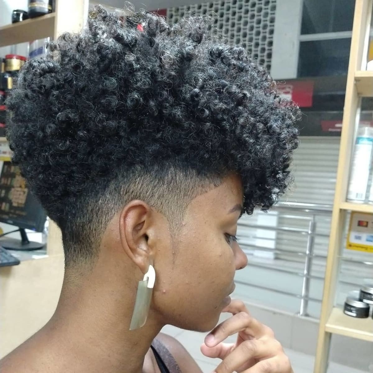 Stylish short curly faux hawk