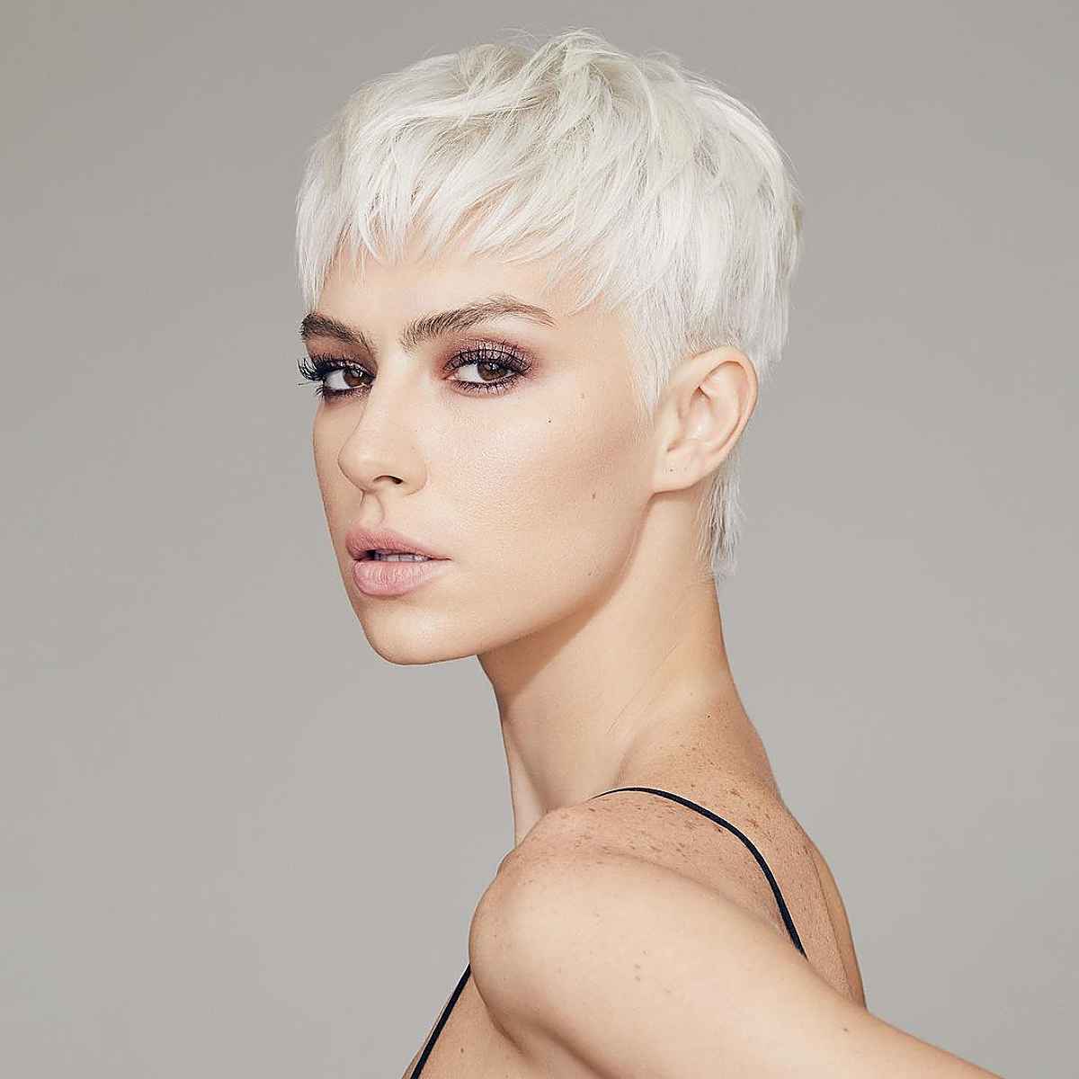 Stylish Short Platinum Pixie with Bangs