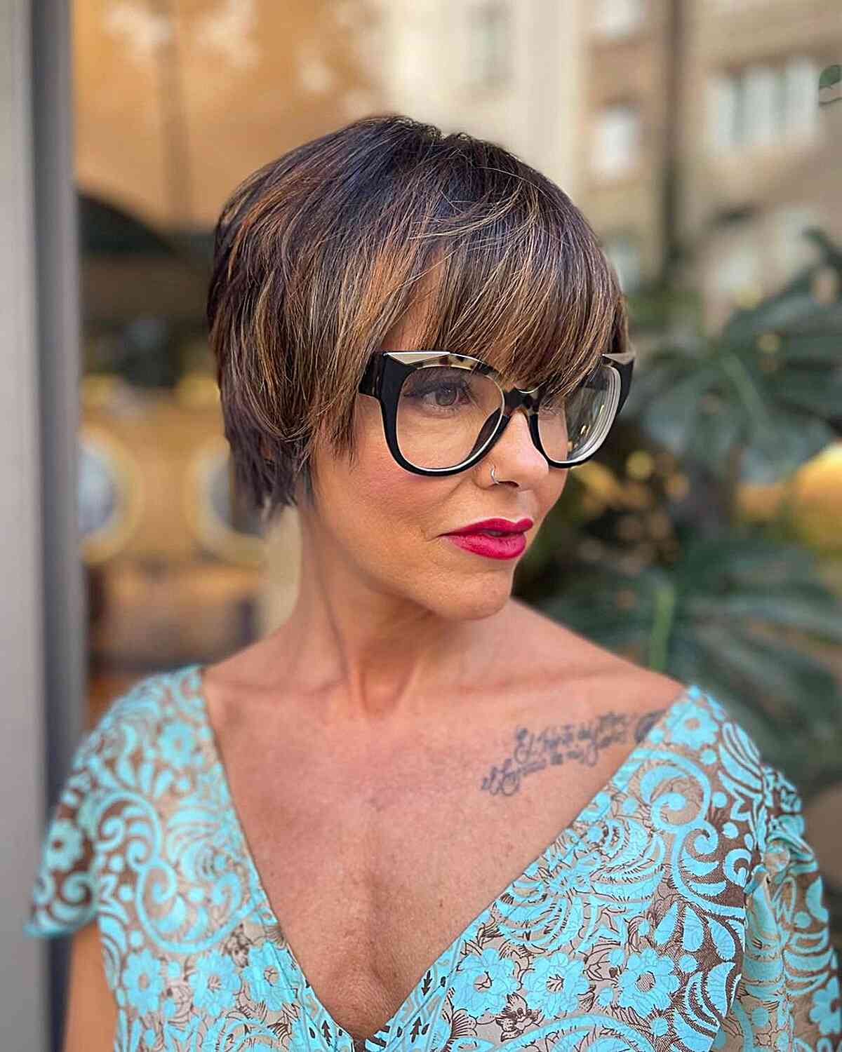 Stylish Short Shag Hairstyle for Women with Bangs and Glasses
