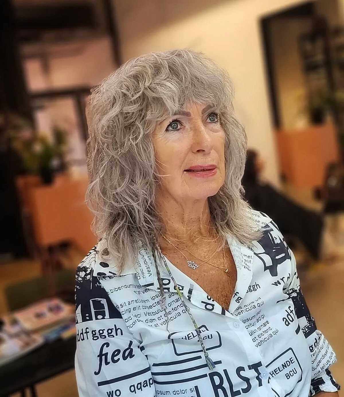 Stylish Silver Curly Shag Cut with Bangs