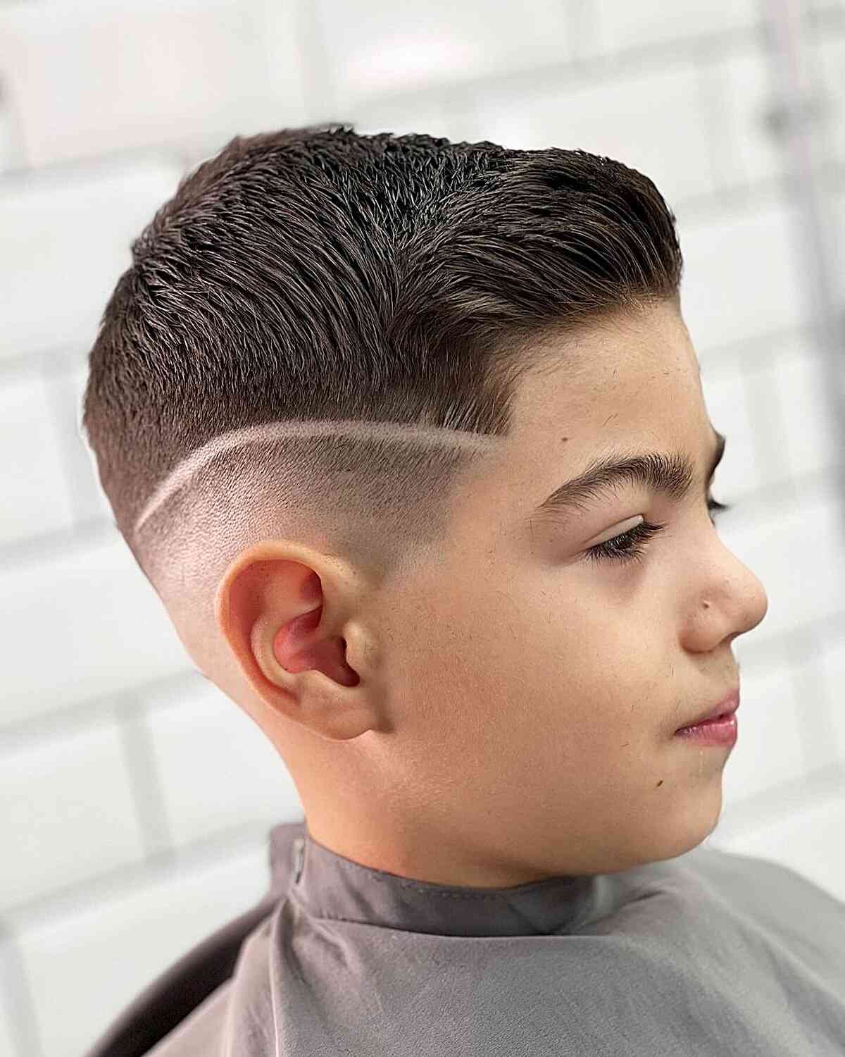 Stylish Skin Fade with a Design for Younger Boys