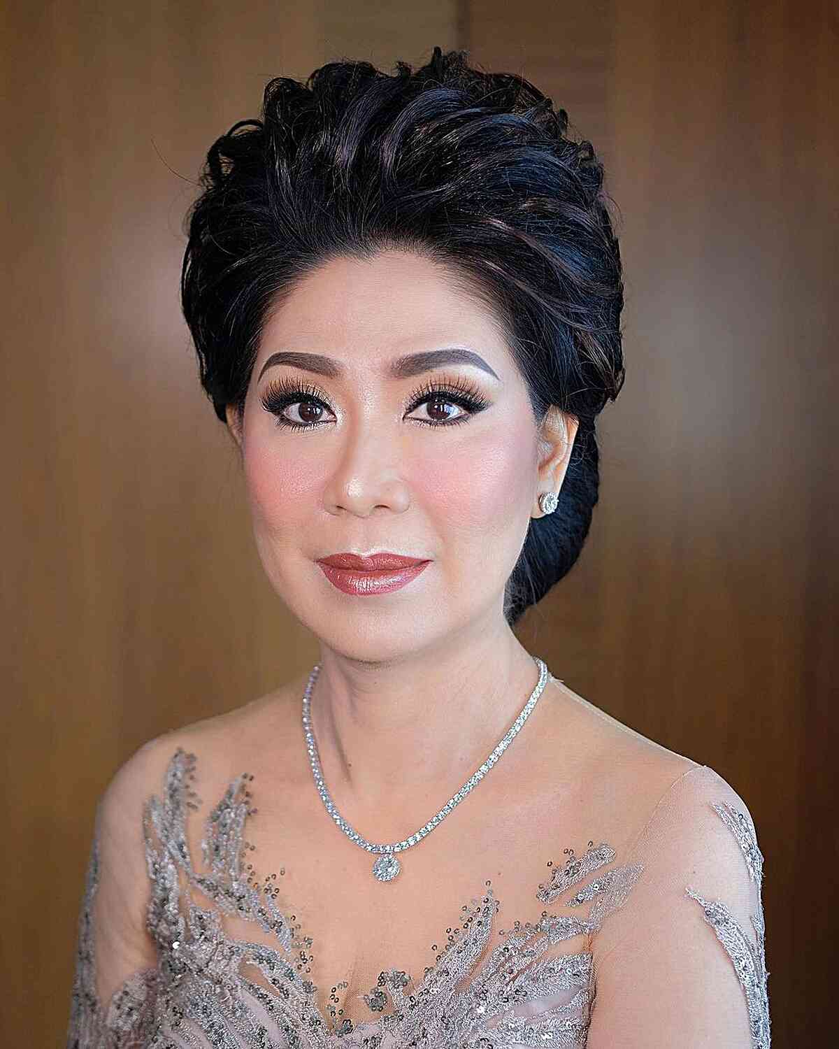 Stylish Textured Beehive Updo for the Groom's Mother