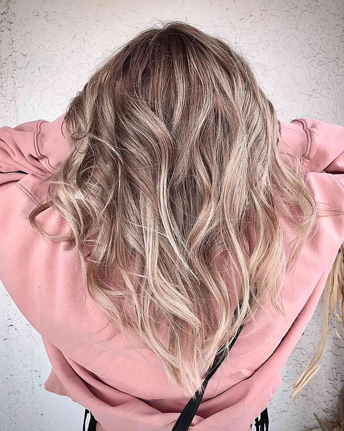 Stylish V-shaped shoulder length cut