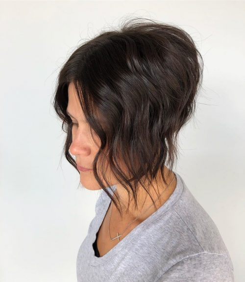 stylish wavy hair with extended bangs