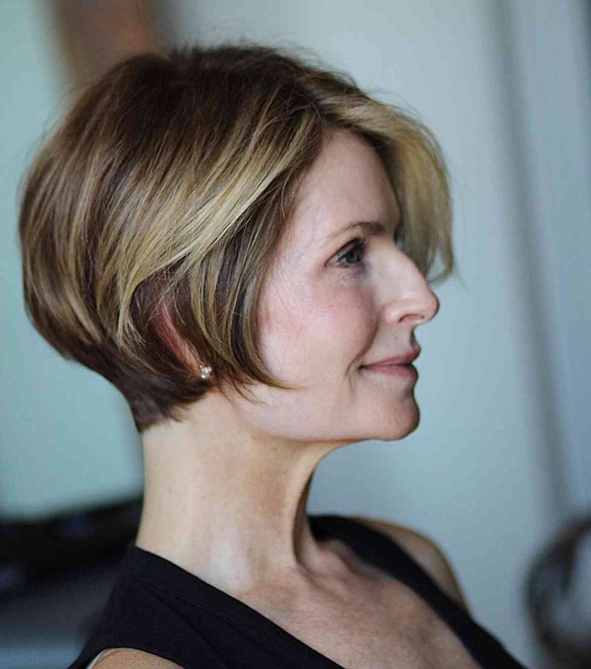 Stylishly Shaped Pixie Bob with Side Part for 50-year-olds
