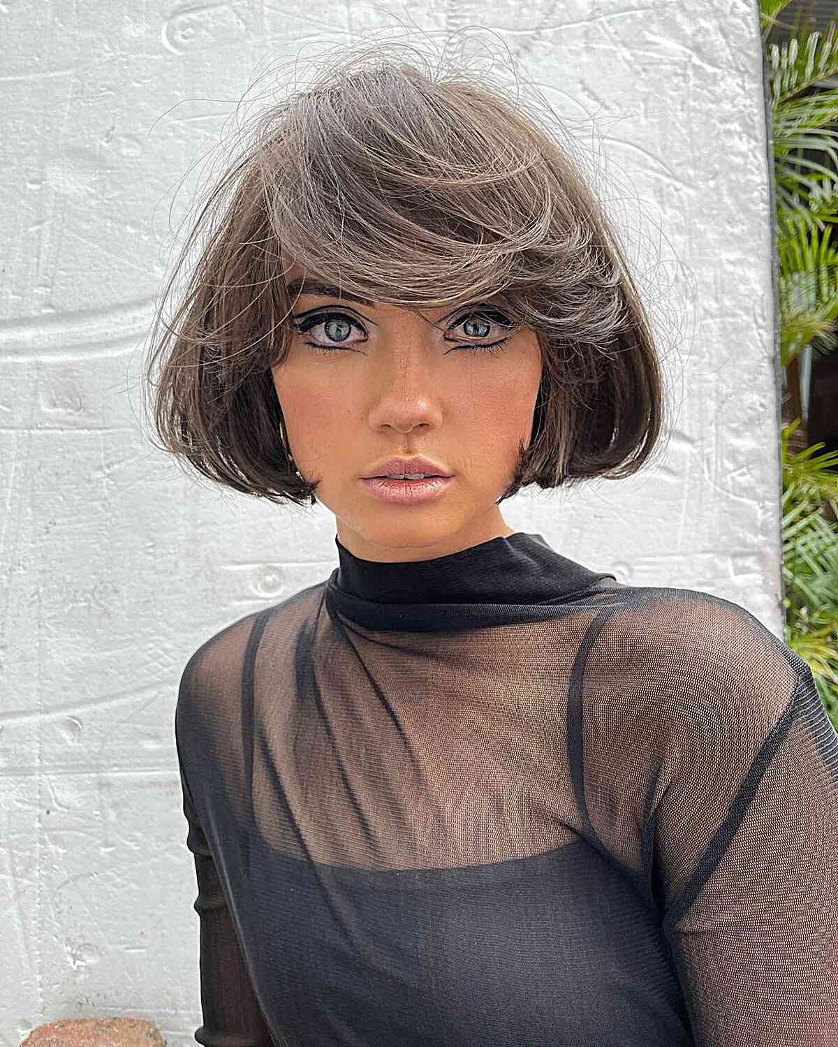 Stylish Ashy Brown Jaw-Length Bob Haircut