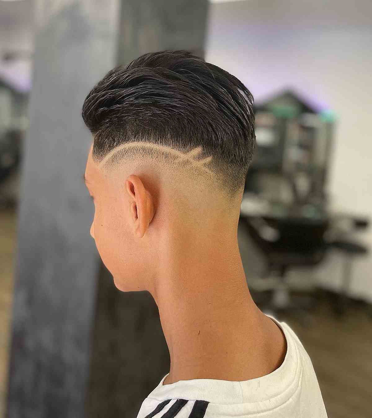 Stylish Low Taper Fade with Shaved Lines for Men