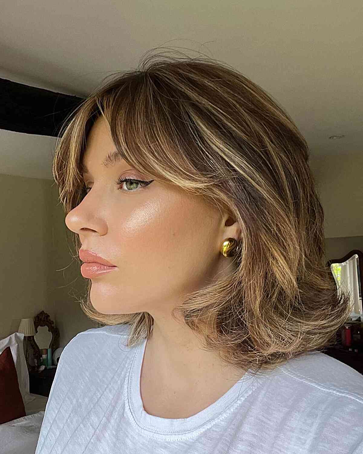 Above-the-Shoulder Textured and Soft Boyfriend Bob Hairstyle with Bangs