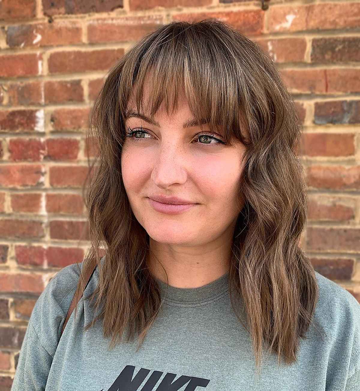 Textured Bangs for Brunette Wavy Locks