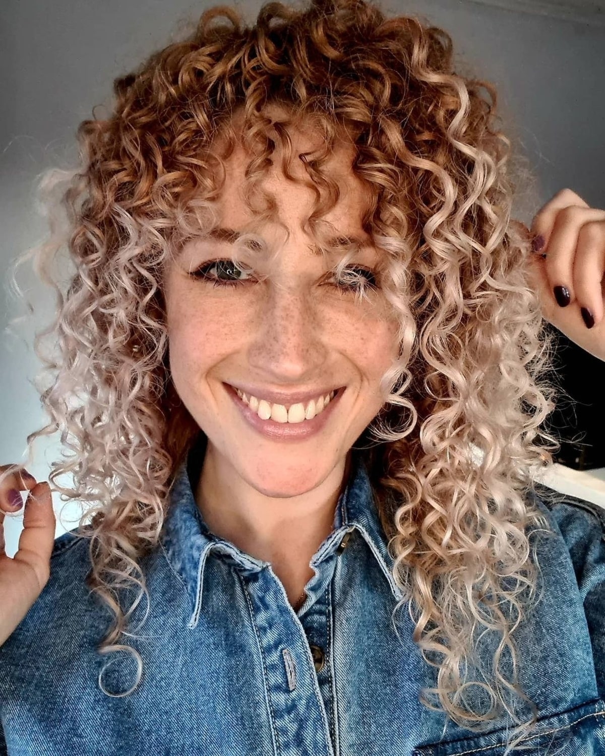 Textured bangs on curly hair