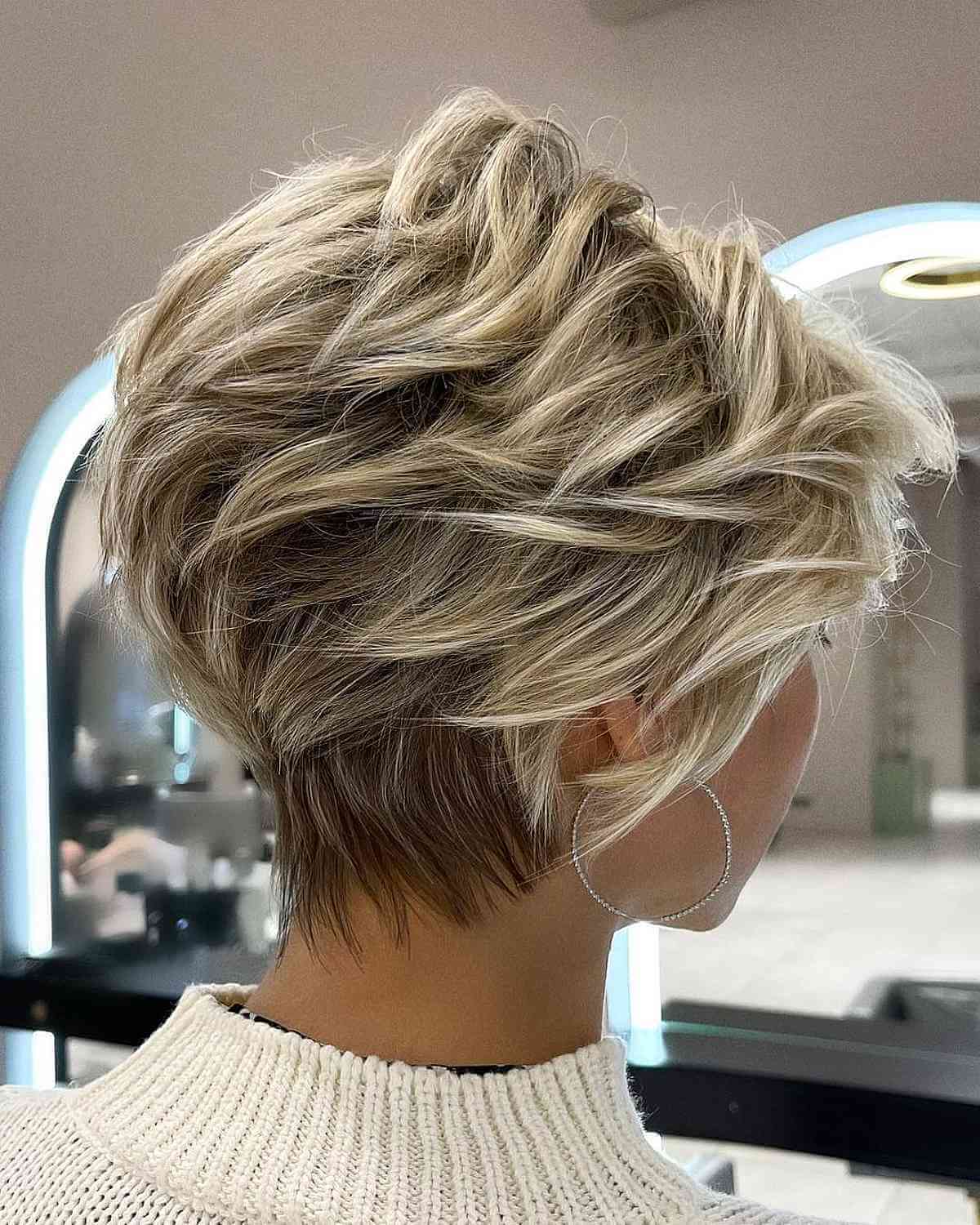 Short Layered Bixie with Golden Highlights for Thick Hair