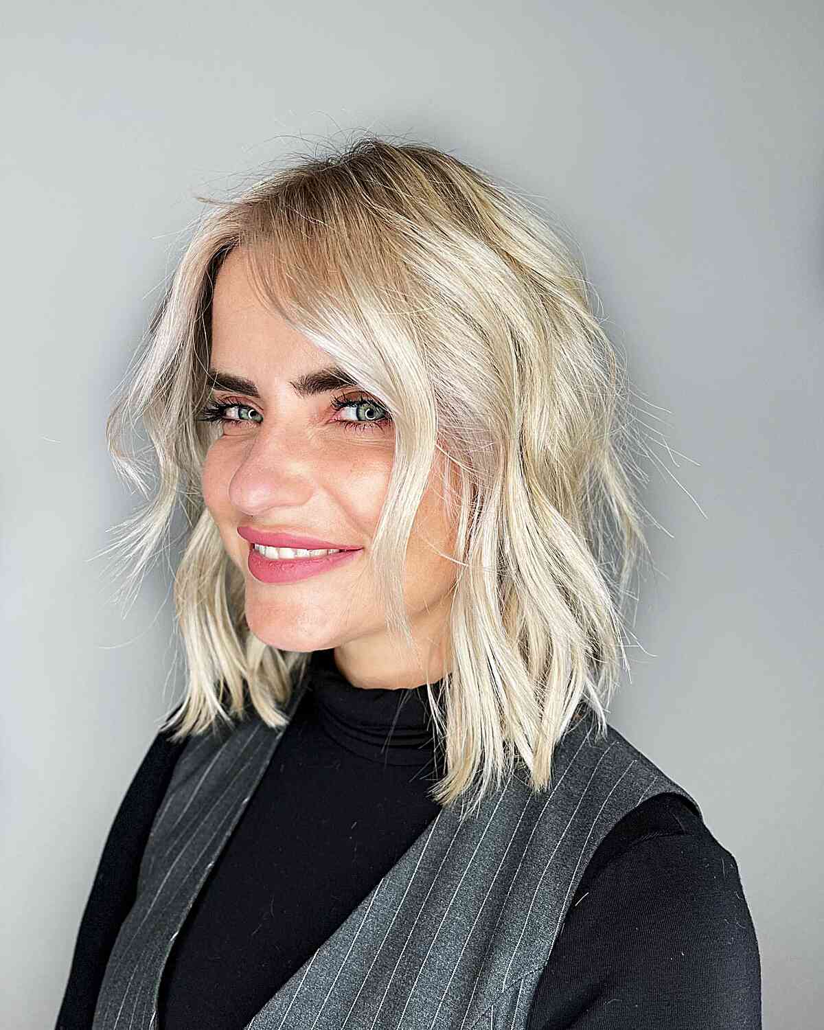 Medium-Length Textured Blonde Lob for Fine Hair