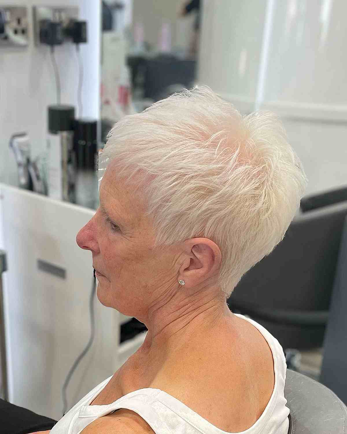 Textured Blonde Pixie with Thinning Choppy Layers