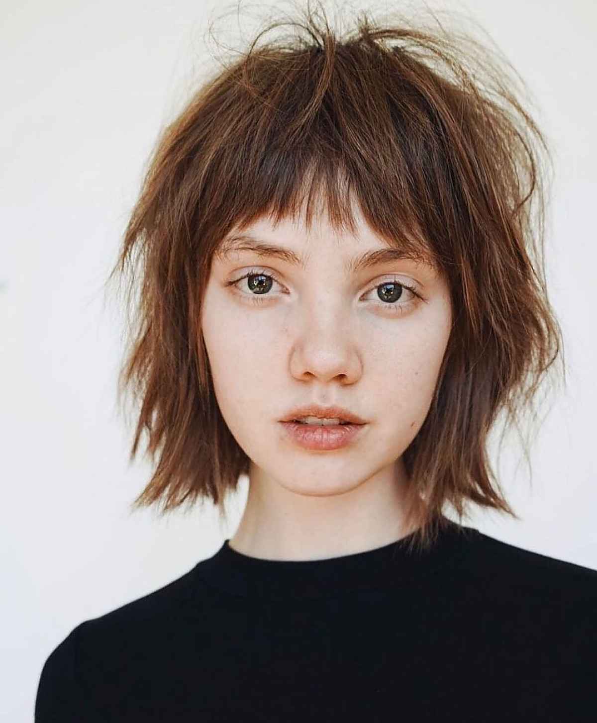 Textured Bob with Brief Bangs and Layers for Women with Thick Hair