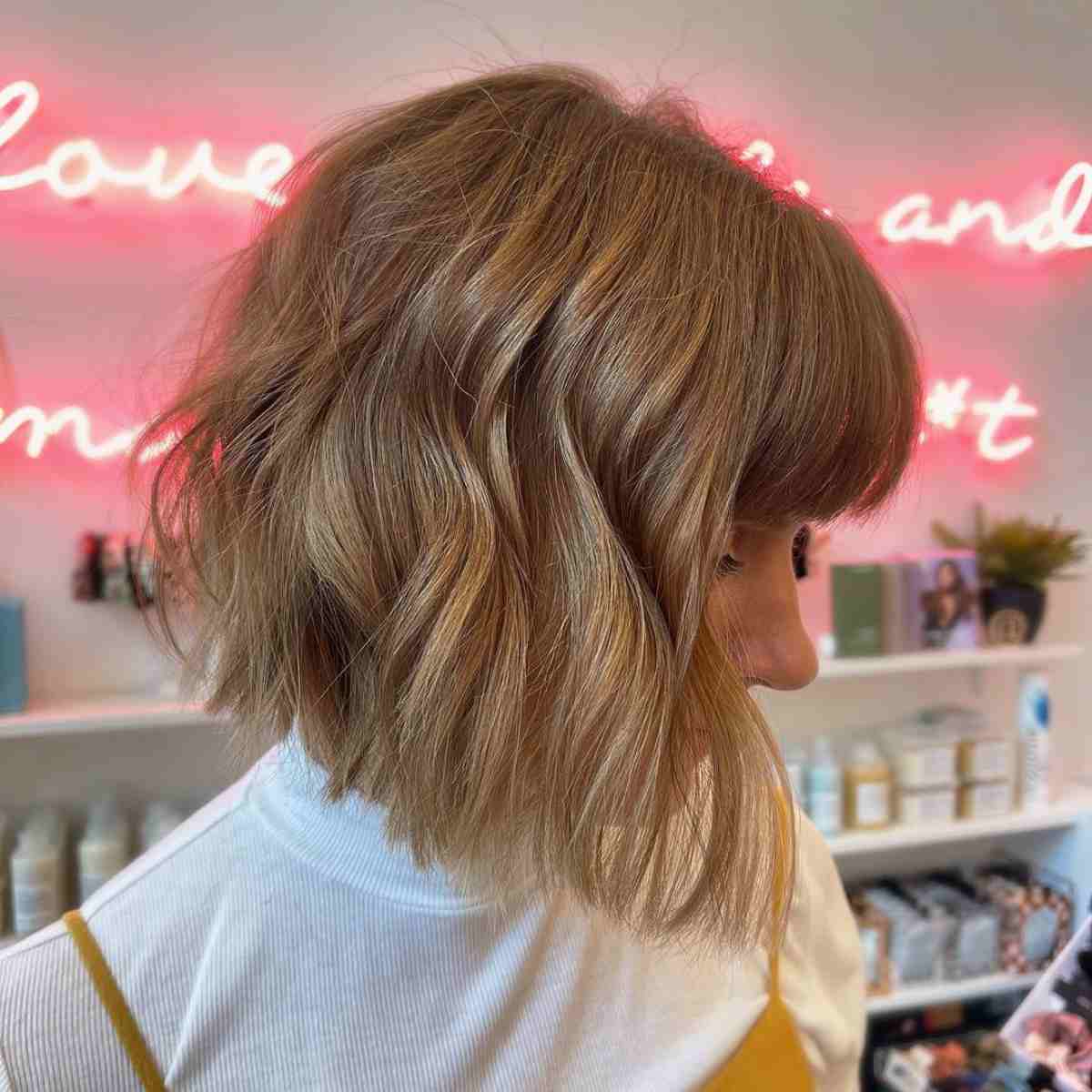 Chin-Length Chopped Bob with Full Bangs for Wavy Fine Hair