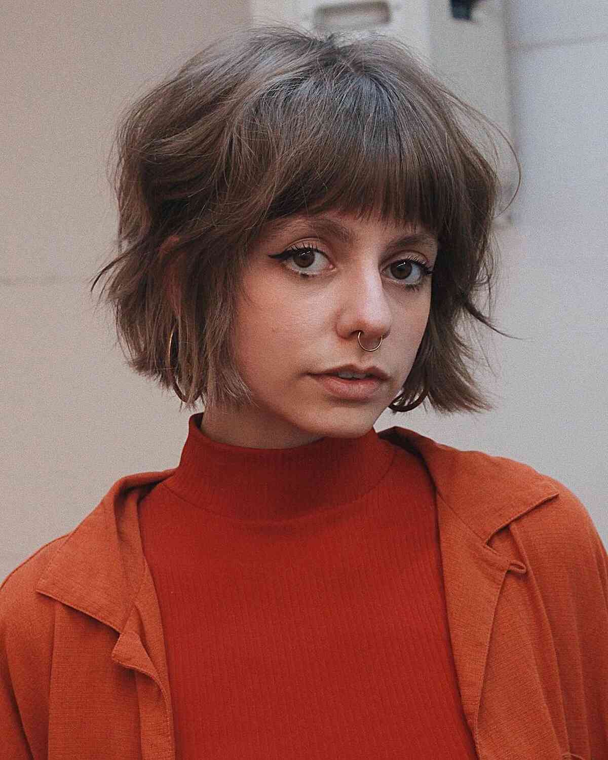 Textured Bob with Sleek Fringe for women with oval faces