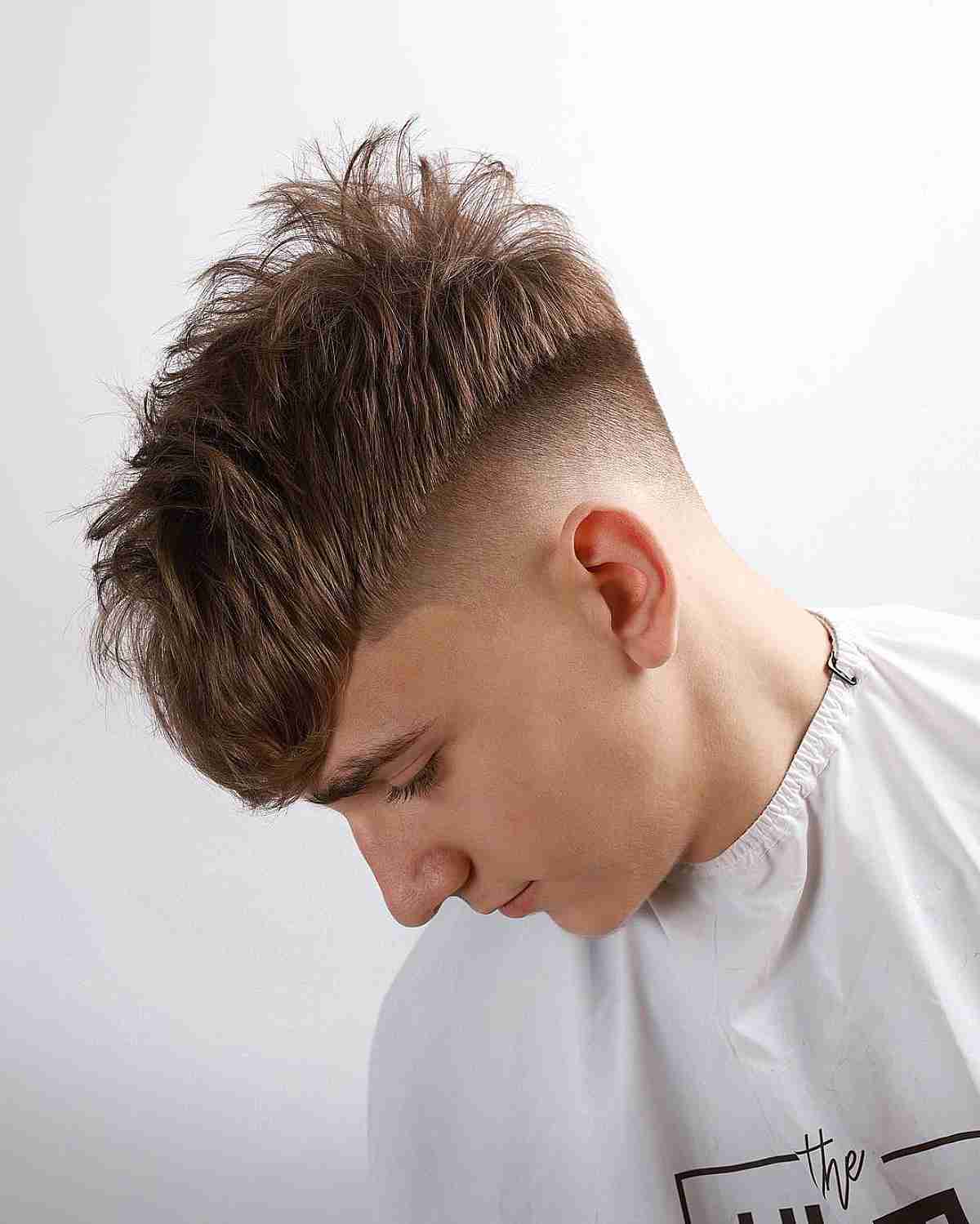 Textured Brushed Forward French Crop with a Mid Fade for Men with Thick Textured Hair