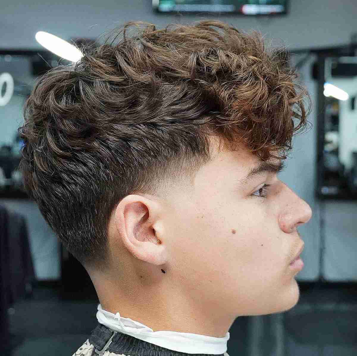 Taper Fade Haircut with Messy Curls