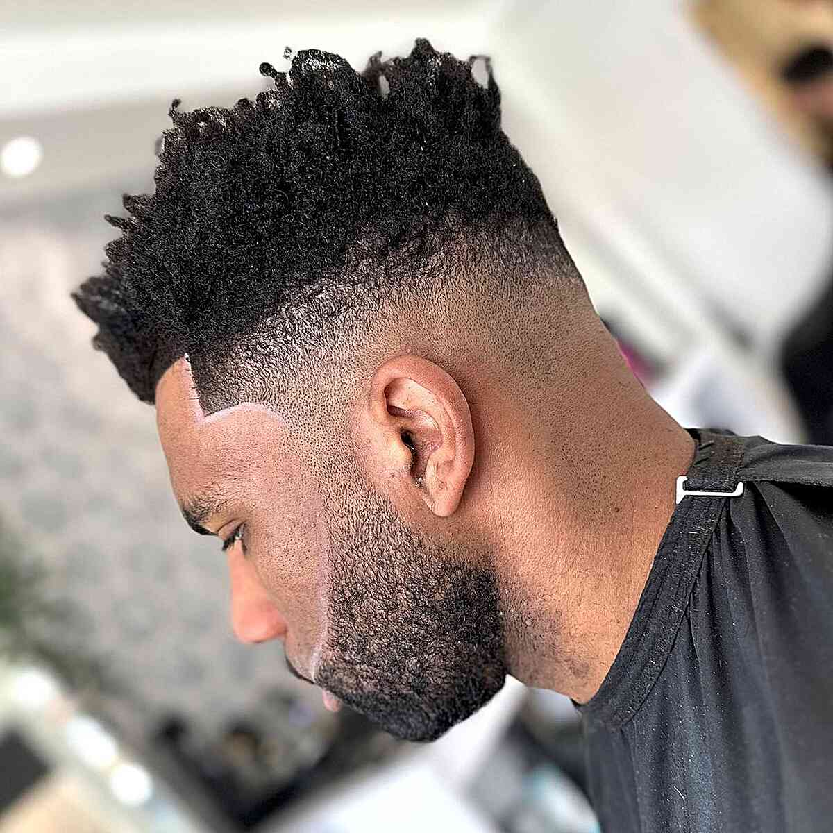 Textured Fade with a Casual Kinky Top for Black Men