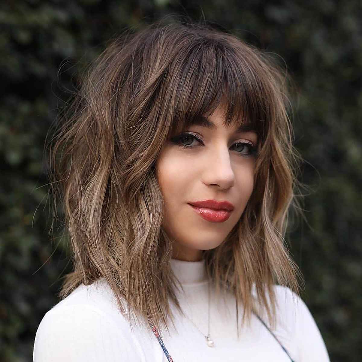 Textured Hair with Feathered Bangs