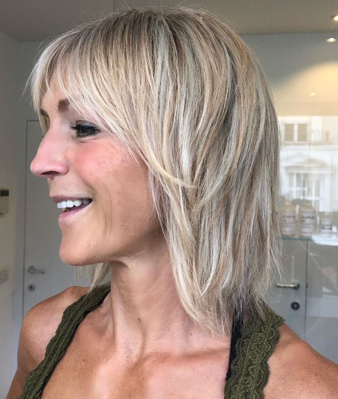 woman over 50 with textured layered cut shag