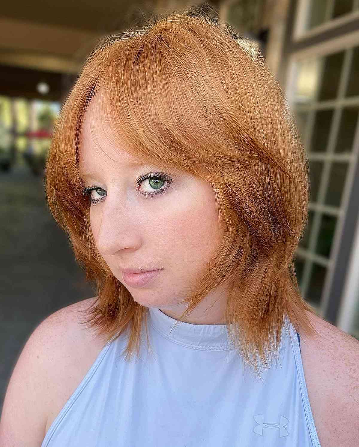 Textured Layered Shag with Soft Curtain Bangs for Short Straight Hair