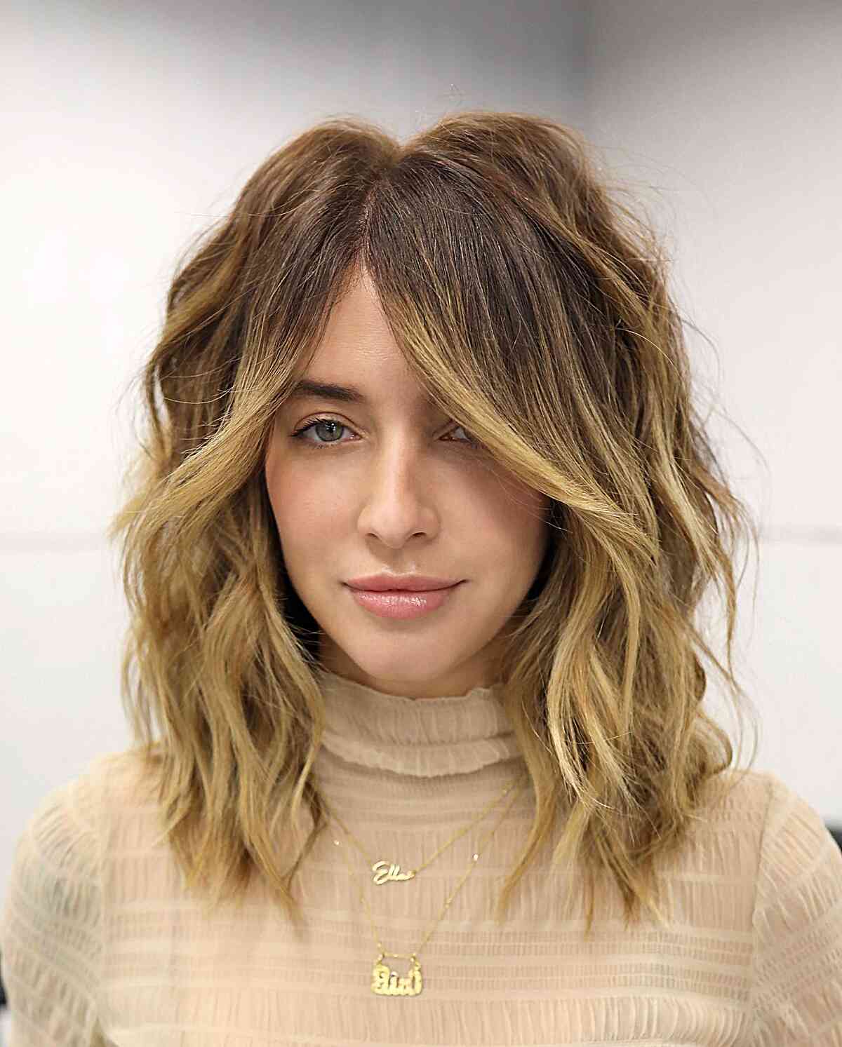 Textured Layered Waves Featuring Curtain Bangs
