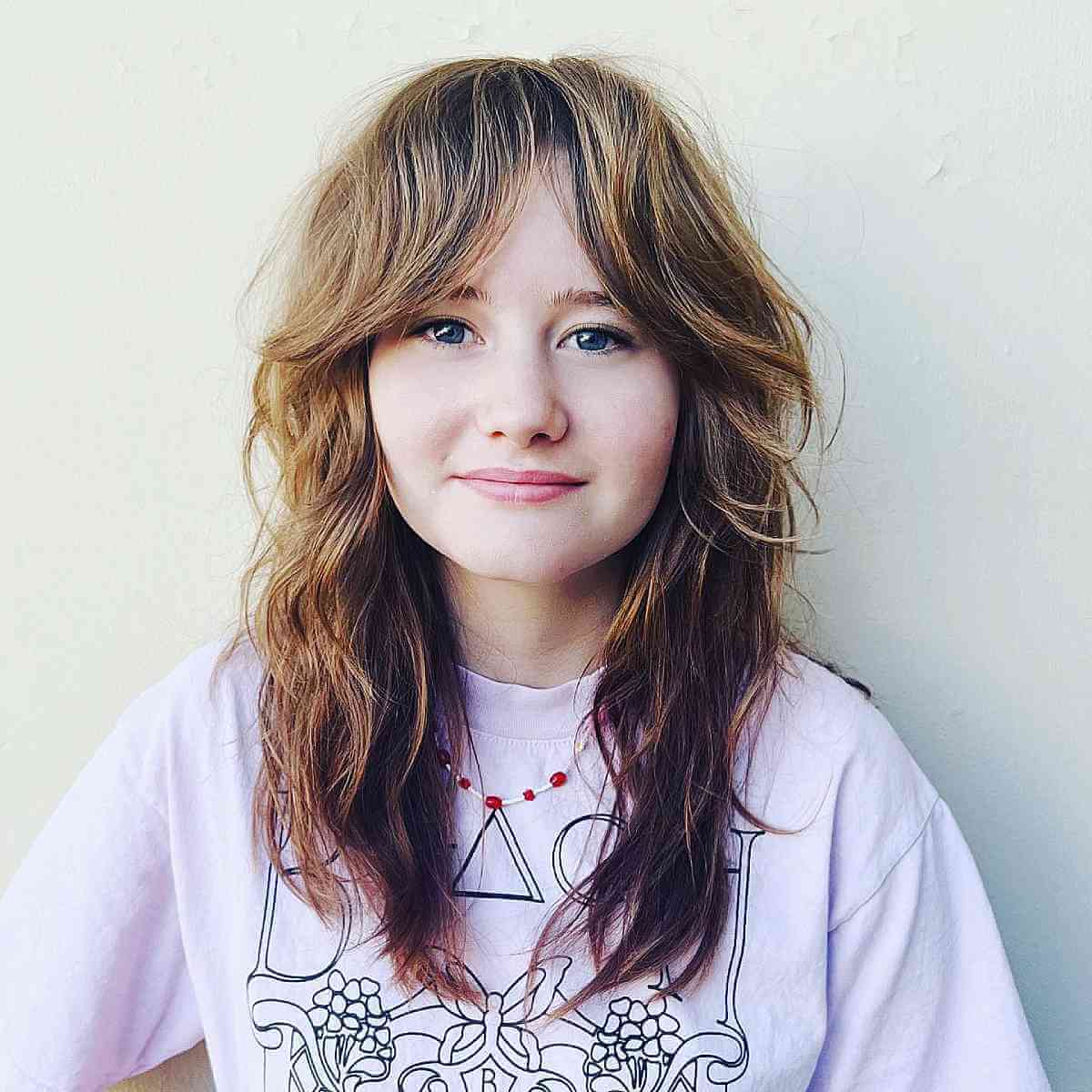 Textured Layers with Inverted Ombre and Curtain Bangs