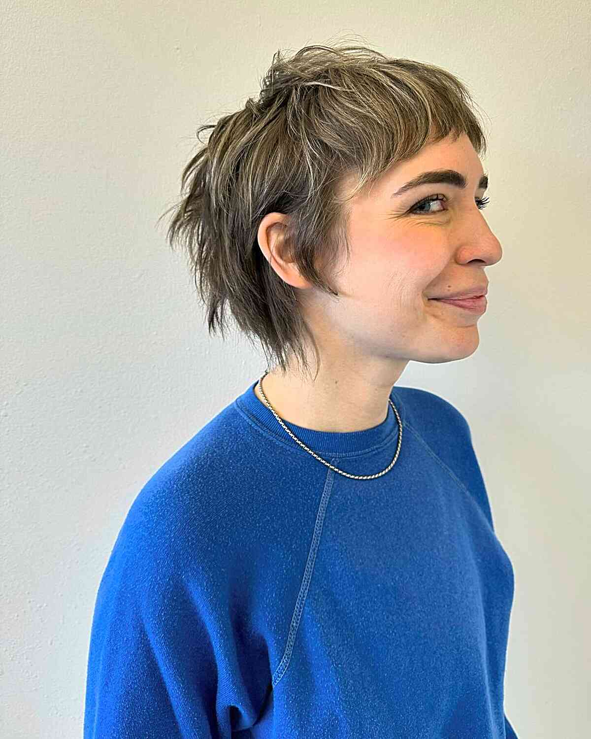 Textured Long Shaggy Pixie Cut with Mini Bangs