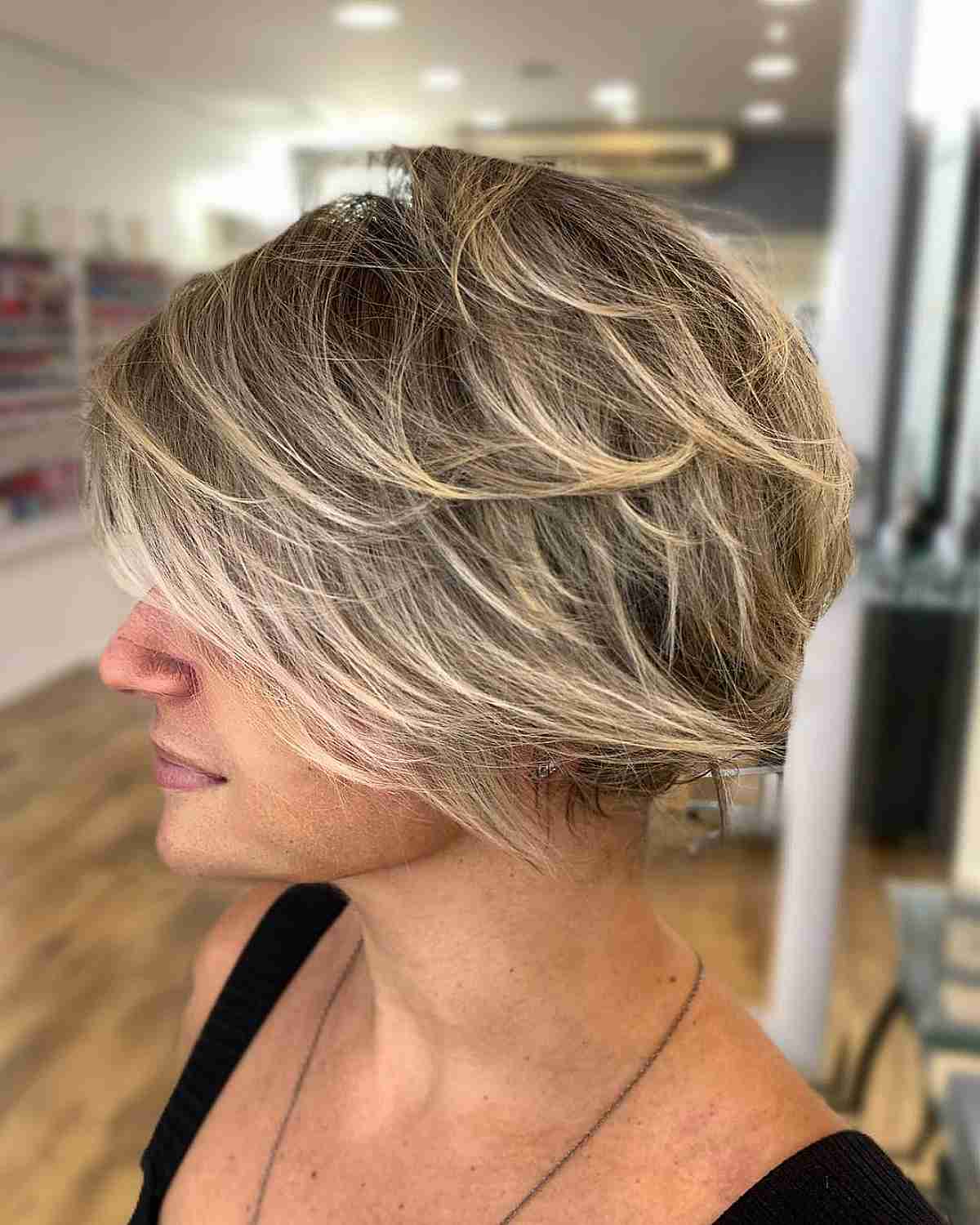 Chin-Length Multi-Layered Messy Choppy Bob with Blonde Highlights