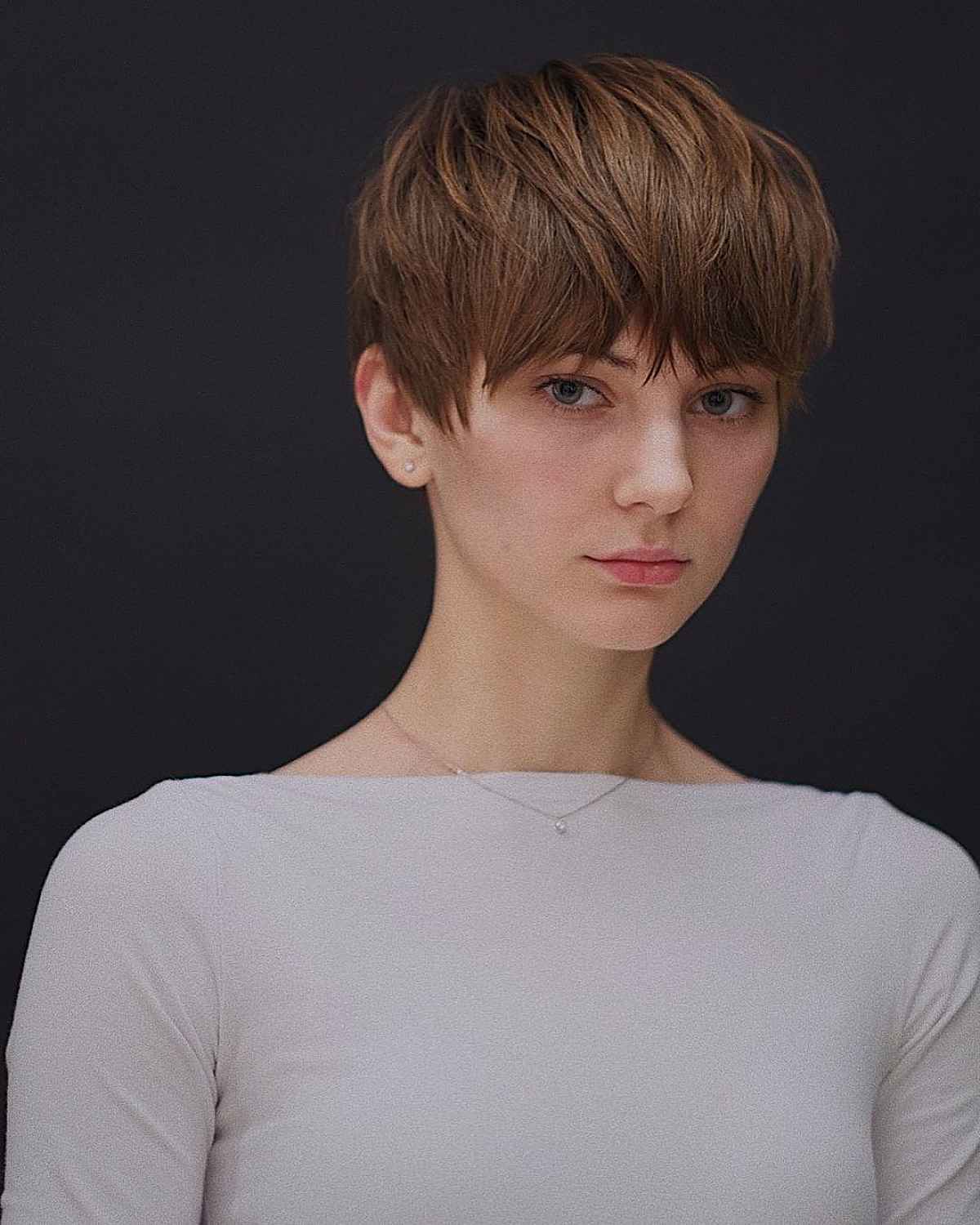 Textured Pixie Cut with Bold Bangs
