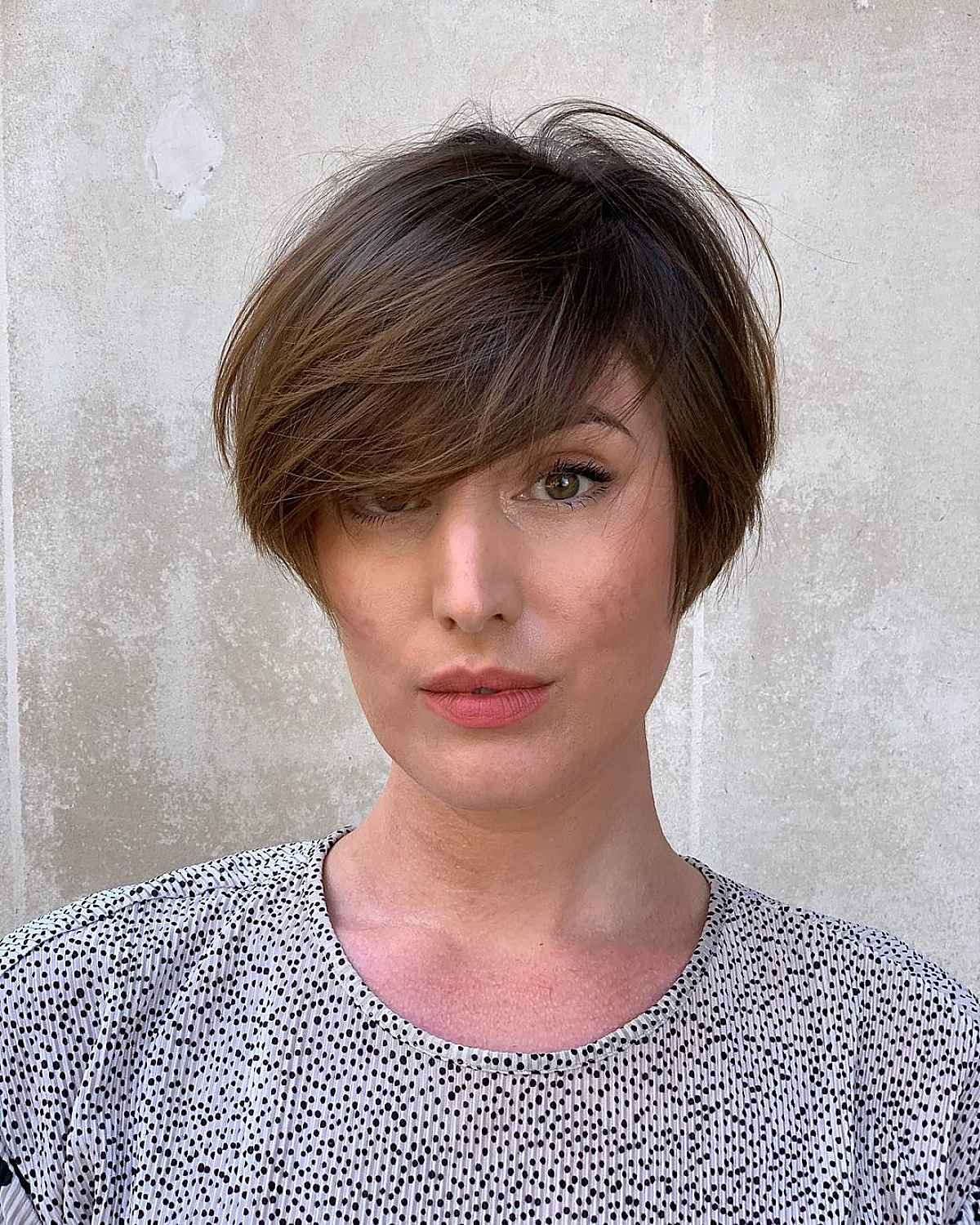 Textured Pixie Cut with Extended Fringe for Fine Hair