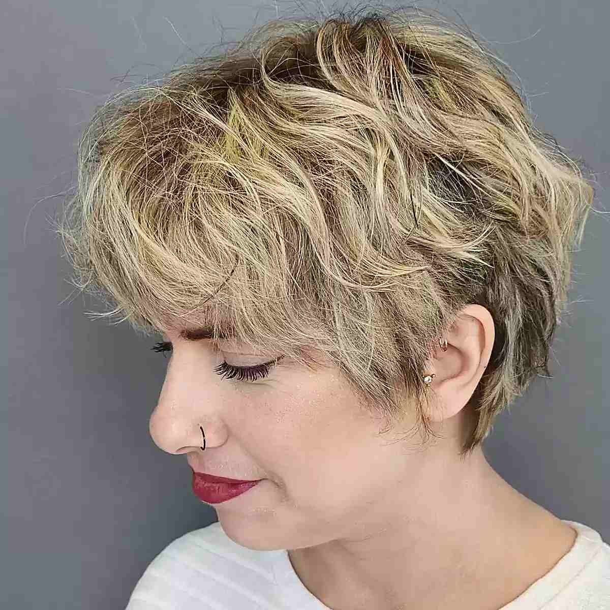 Short Textured Pixie with Blonde Foilayage for Thick-Haired Women