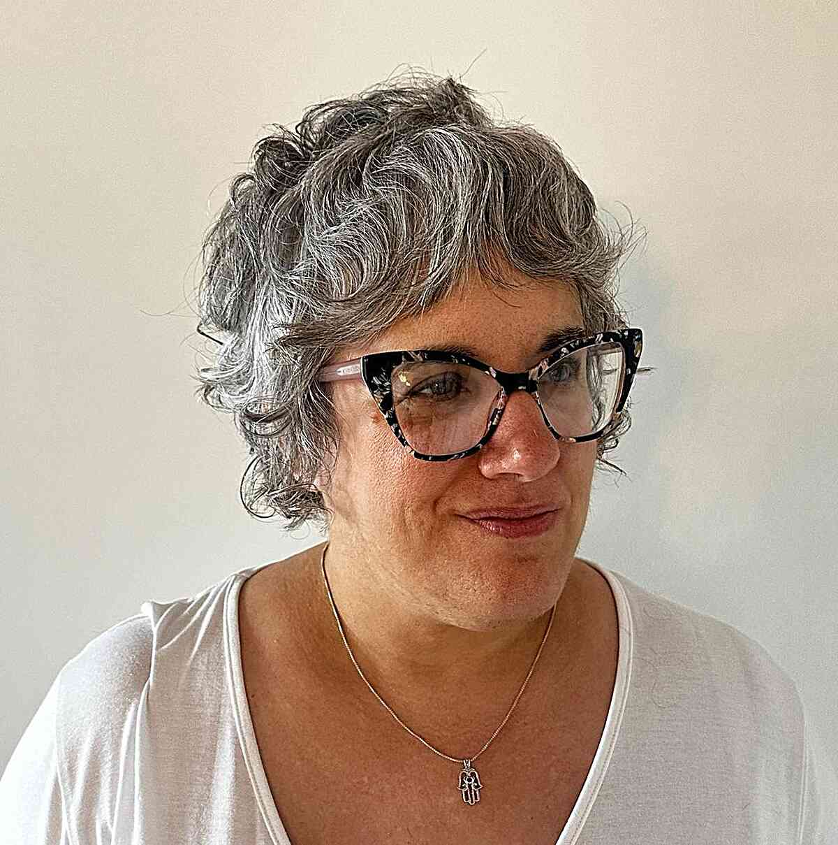 Silver Textured Pixie with Shaggy Layers for Mature Women with Glasses