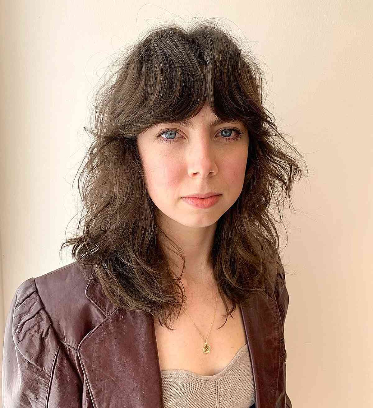 Summer Textured Razored Shag Cut with Luxurious Curtain Bangs