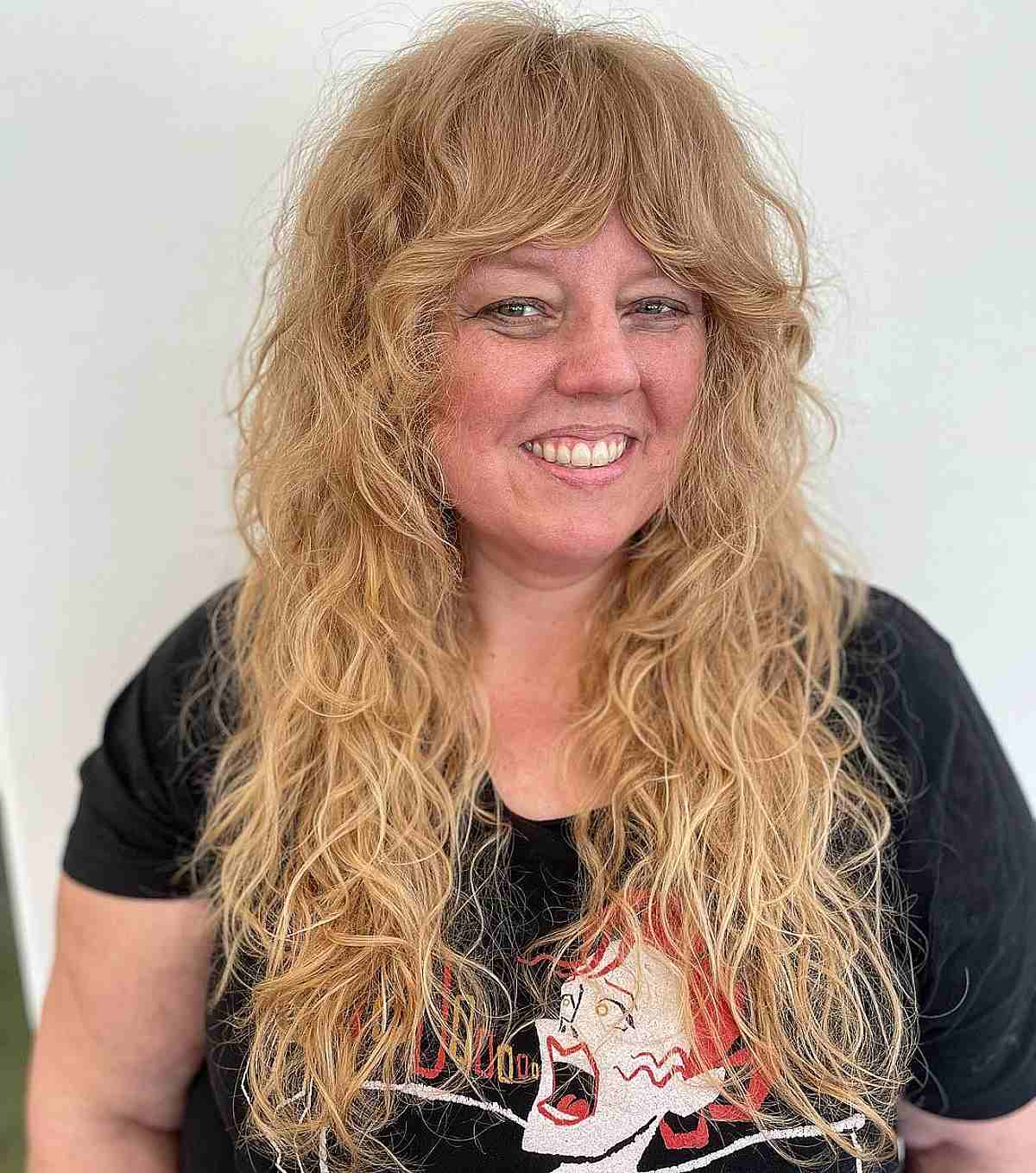 Long Textured Shag with Soft Bangs on Women Over 50