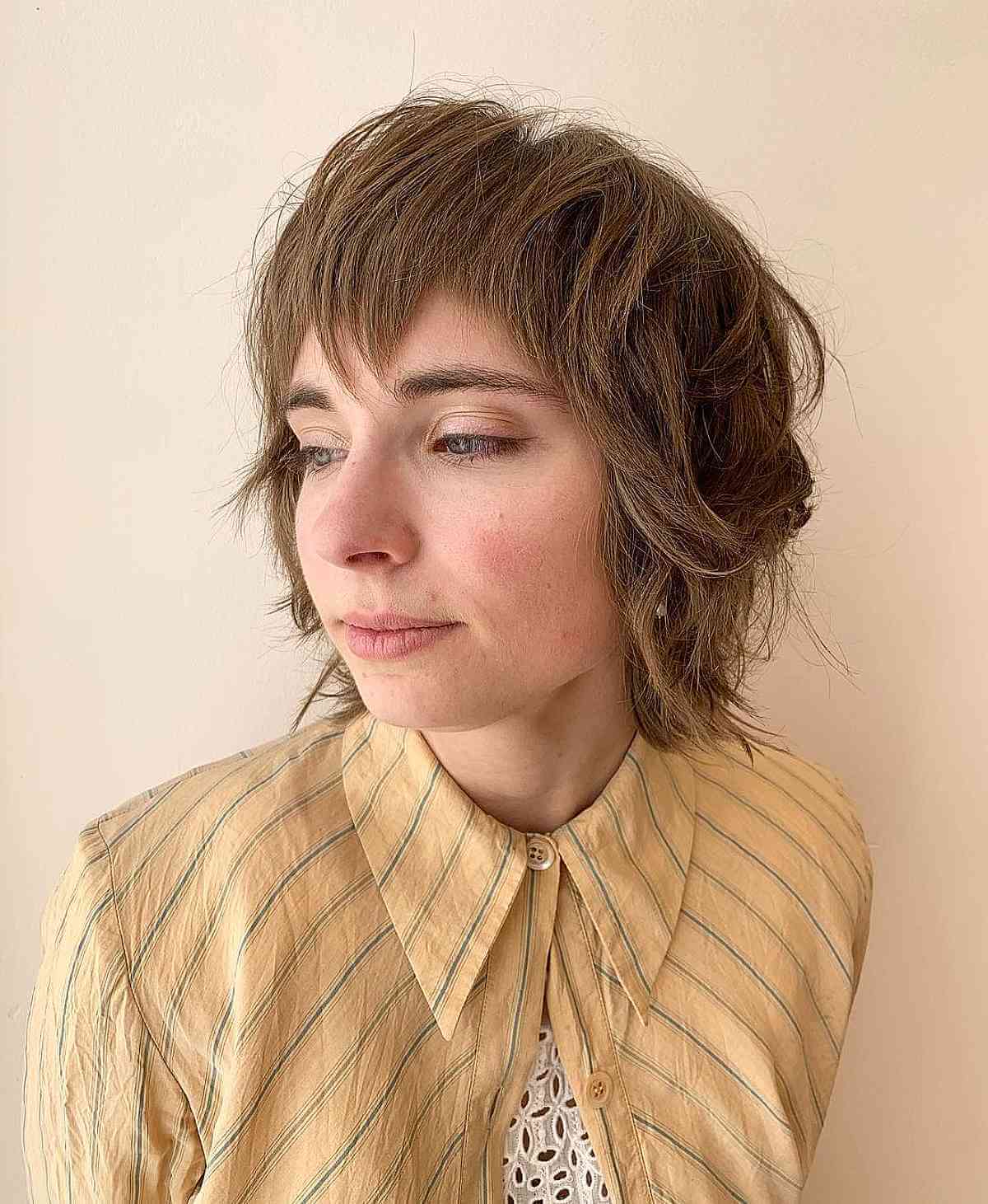 Textured Shag with V-Cut Bangs for Short Thick Hair