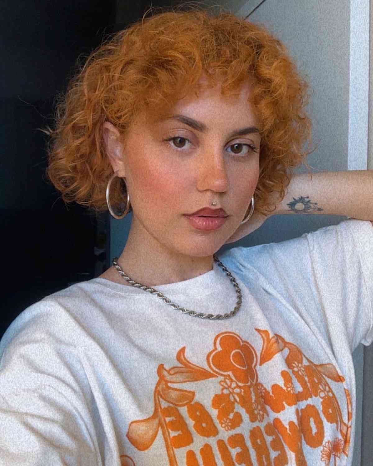 Jaw-Length Textured Shaggy Layers for Short Curly Locks