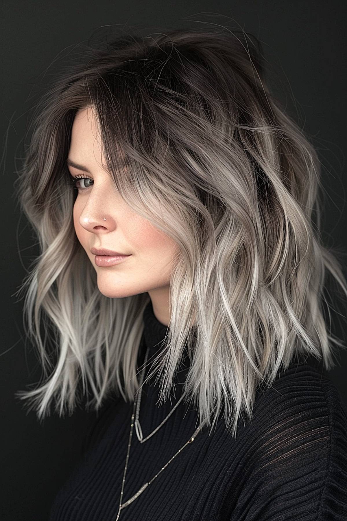 Textured shatterlayer hairstyle with silvery-gray ombre